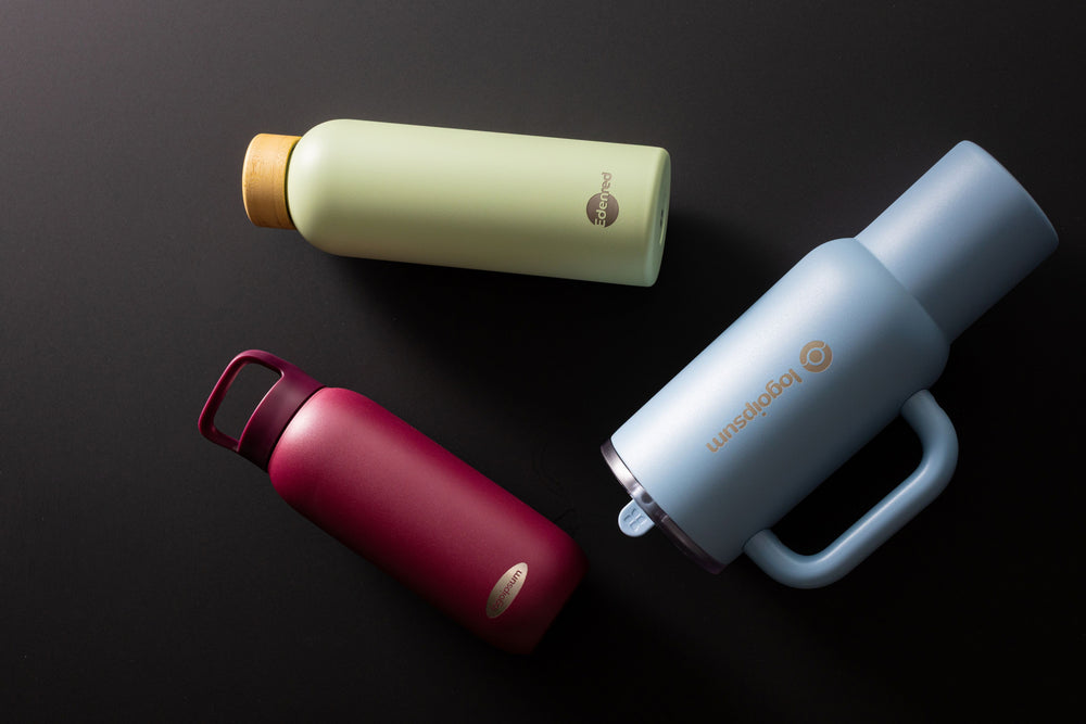 Engraved waterdrop bottles in use at an event